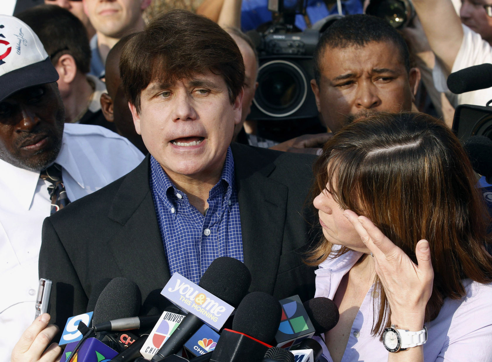Speaks to media